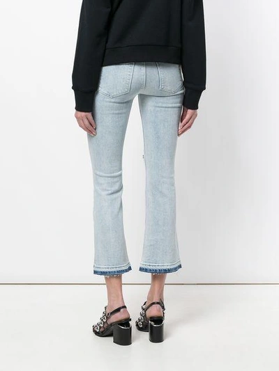 Shop Rta Cropped Flare Jeans In Blue