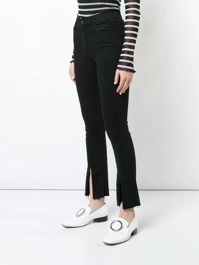 Shop Mother Front Slit Jeans In Black
