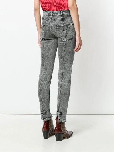 high-waist lightning bolt jeans