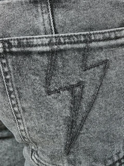 high-waist lightning bolt jeans