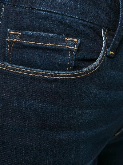 Shop Frame Distressed Hem Cropped Jeans In Blue