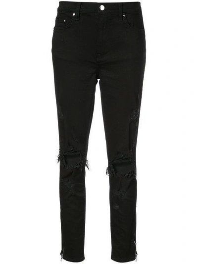Shop Amiri Thrasher Skinny Jeans In Black