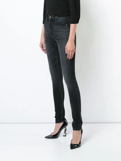 Shop Saint Laurent High Waisted Skinny Jeans In Black