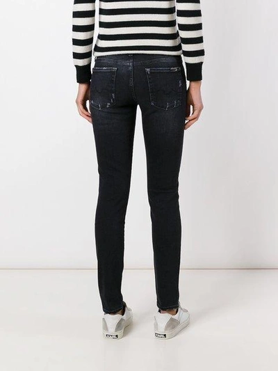 Shop 7 For All Mankind Distressed Skinny Jeans - Black