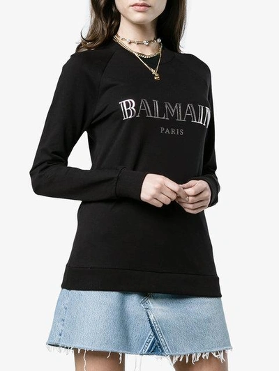 Shop Balmain Long-sleeved Logo Sweatshirt - Black