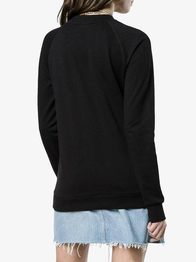 Shop Balmain Long-sleeved Logo Sweatshirt - Black