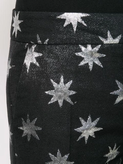 Shop Christian Pellizzari Star Print Trousers - Black