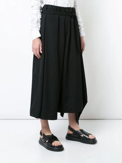 Shop Yohji Yamamoto Asymmetric Cropped Palazzo Trousers - Black