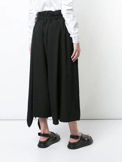 Shop Yohji Yamamoto Asymmetric Cropped Palazzo Trousers - Black