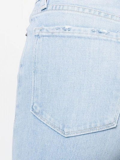 Shop Frame Stonewash Flared Jeans In Blue