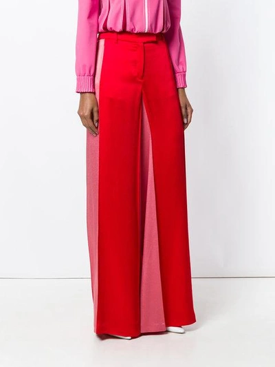 Shop Valentino Colourblock Palazzo Pants In Red