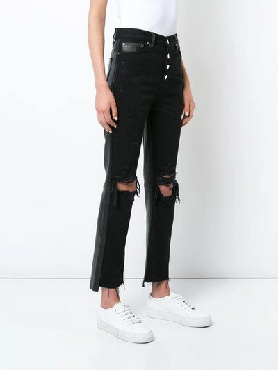 Amiri Leather And Denim Crop Flare Jeans In Black