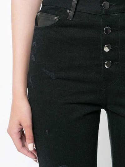 Amiri Leather And Denim Crop Flare Jeans In Black