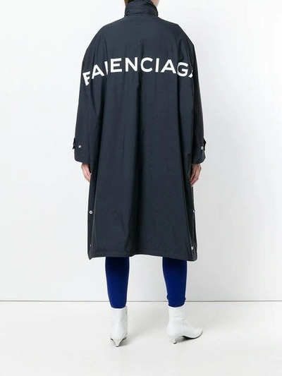 Shop Balenciaga Logo-print Raincoat In Black