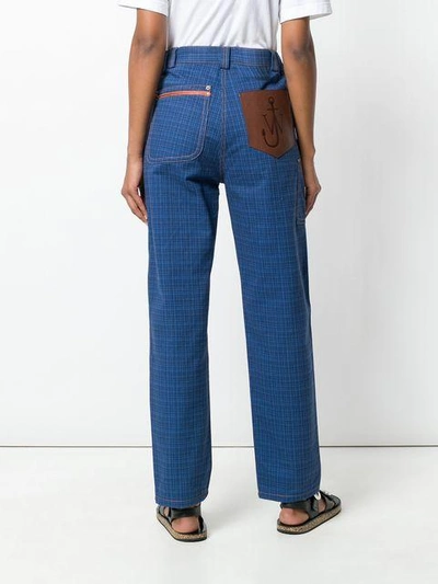 Shop Jw Anderson Check Print Trousers In Blue