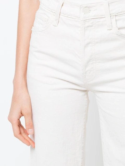 Shop Mother High-waist Flared Jeans In White