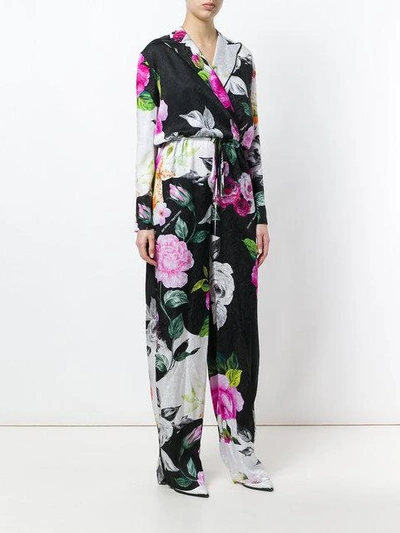 Shop Off-white Floral Print Jumpsuit In Black