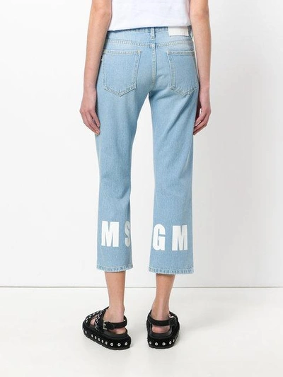 Shop Msgm Cropped Logo Jeans In Blue