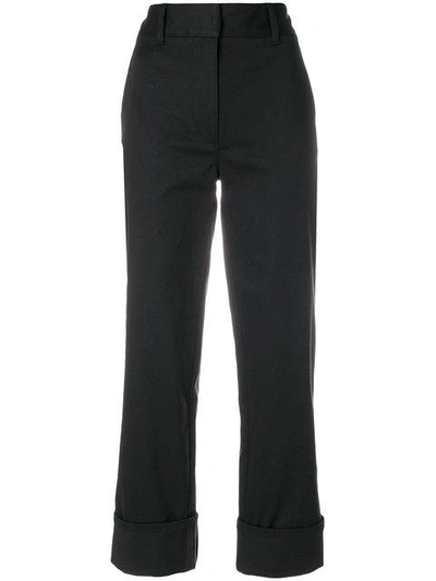 Shop Prada Turn-up Hem Trousers In Black