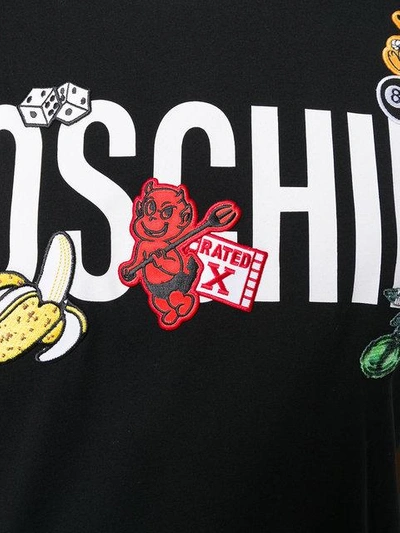 Shop Moschino Patch Logo T-shirt In 1555 Black