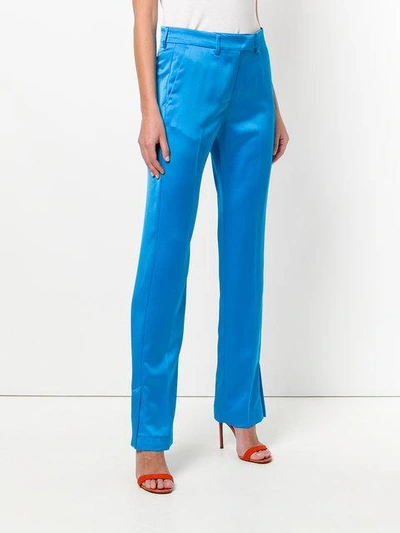 Shop Msgm Side Vent Trousers In Blue
