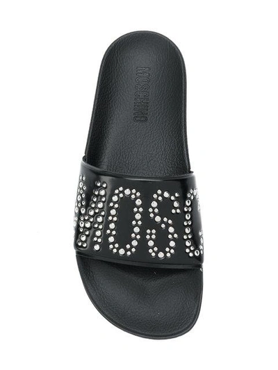 Shop Moschino Micro Studded Sliders - Black