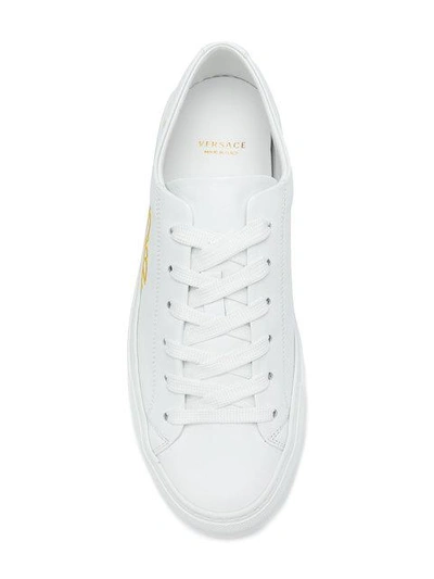 Shop Versace Embroidered Logo Sneakers In White