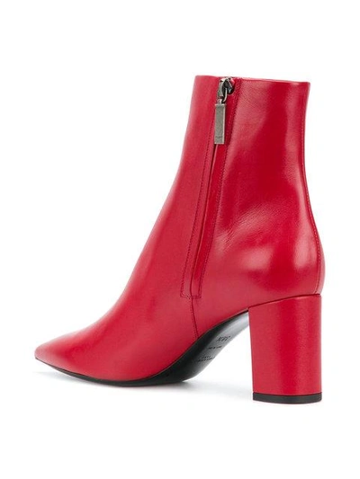 Shop Saint Laurent Pointed Ankle Boots In Red