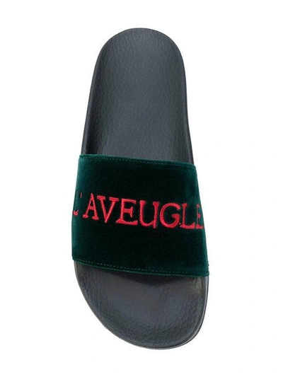 Shop Gucci Embroidered Slides In 3020