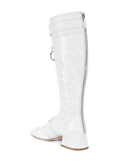 Shop Miu Miu Buckle Strap Boots In White