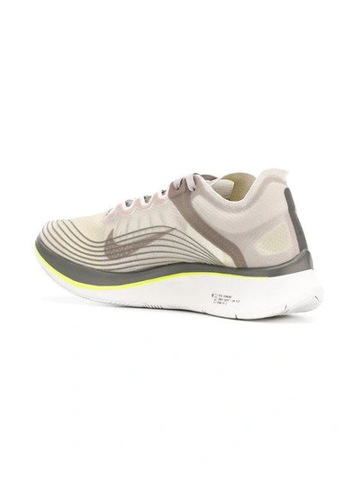 Shop Nike Platform Runner Sneakers - Grey