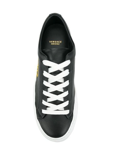 Shop Versace Embroidered Logo Sneakers In K41t