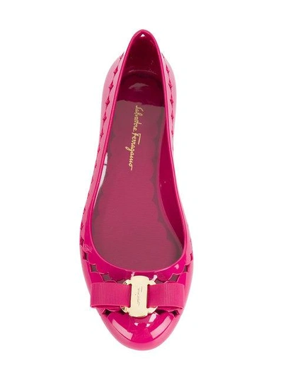 Shop Ferragamo Cut Out Bow Front Ballerina Shoes In Pink