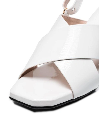 Shop Reike Nen White 60 Patent Leather Cross-over Sandals