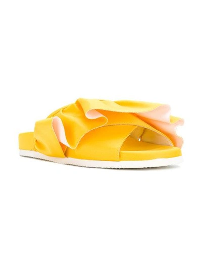 Shop Joshua Sanders Ruffle Trim Slides - Yellow