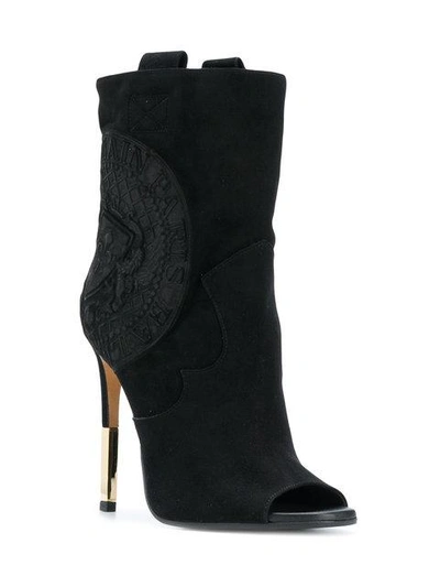 heeled crest ankle boots