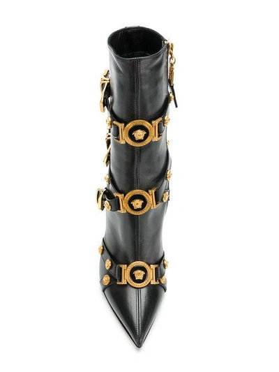 Shop Versace Buckled Ankle Boots