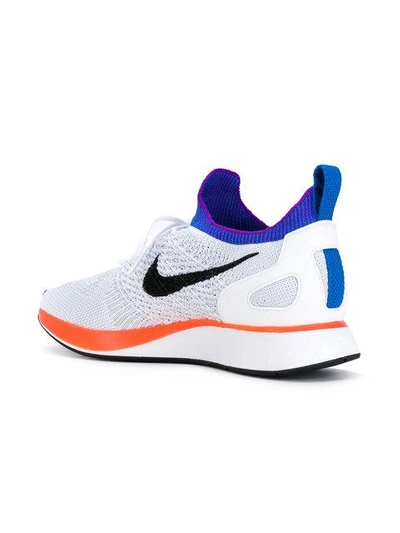 Shop Nike Zoom Mariah Flyknit Racer Sneakers In White
