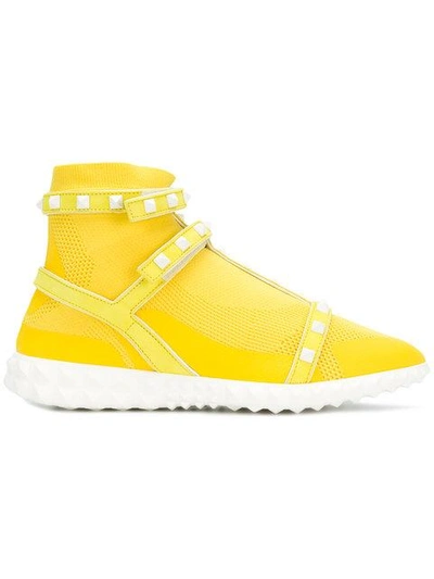 Shop Valentino Free Rockstud Bodytech Sneakers In Yellow