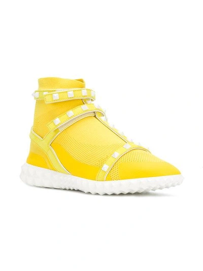 Shop Valentino Free Rockstud Bodytech Sneakers In Yellow