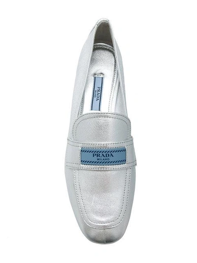 Shop Prada Silver Logo Leather Loafers In Metallic