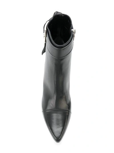 Shop Alexander Mcqueen Eyelet Bow Boots In Black
