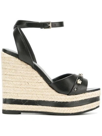 Shop Versace Wedge-sandalen Mit Medusa-nieten In Black