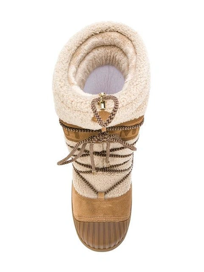 Shop Moncler Moon Boots In Beige