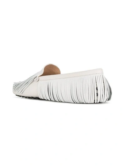 Shop Tod's Fringed Slip-on Loafers - White