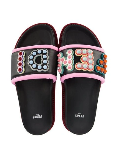 Shop Fendi Studded Logo Leather Slides In Black