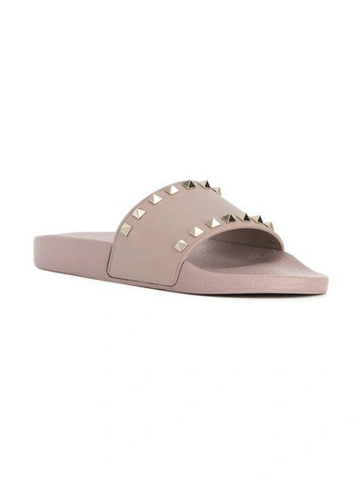 Shop Valentino Rockstud Slides In Neutrals