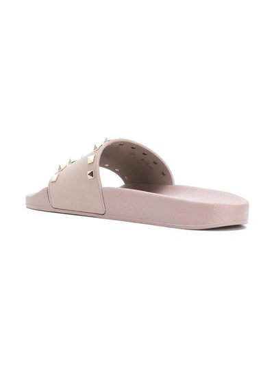 Shop Valentino Rockstud Slides In Neutrals