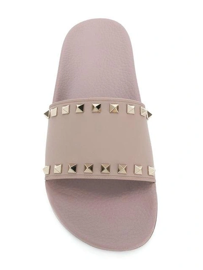 Shop Valentino Rockstud Slides In Neutrals