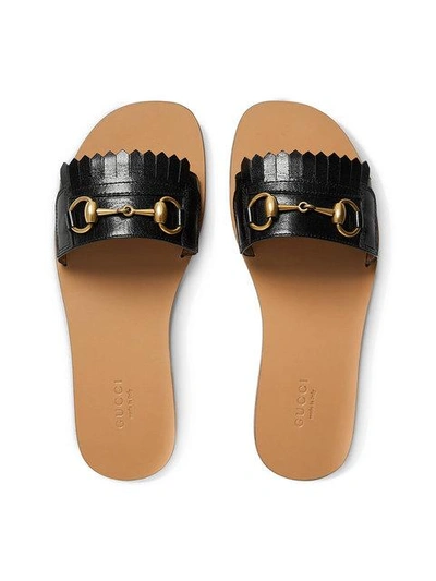 Shop Gucci Fringe Leather Horsebit Slides In 1000 Black